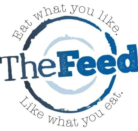 Blue and white logo for The Feed restaurant