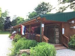 Exterior of Old Man’s Cave General Store surrounded by greenery
