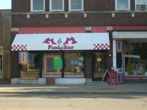 M&M Diner exterior with red awnings and checkered trim