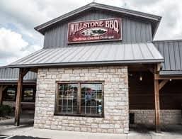 Front view of Millstone Southern Smoked BBQ with stone facade