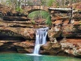 Rock formation and waterfall at Old Man’s Cave trail in Hocking Hills