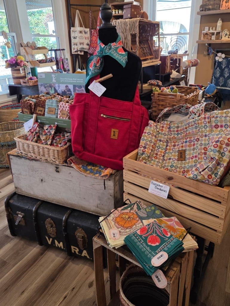 Fair trade and handmade gifts on display at Gifts That Give Back shop in downtown Logan, Ohio